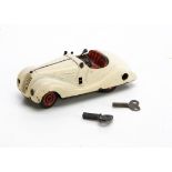 Schuco Examico 4001 Clockwork Car, in white, tested well, two non original keys, F-G, lacks