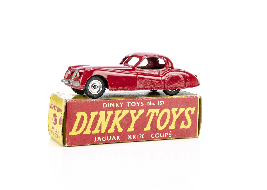 A Dinky Toys 157 Jaguar XK120 Coupe, red body, spun hubs, in original non-picture box, VG,