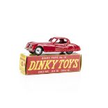A Dinky Toys 157 Jaguar XK120 Coupe, red body, spun hubs, in original non-picture box, VG,