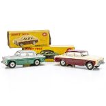 Dinky Toys 165 Humber Hawk, maroon lower body and roof, cream upper body, spun hubs, 168 Singer