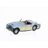 A Scalextric Electric Tinplate MM/C53 Austin Healey 100/6, metallic blue body, cream side panels,