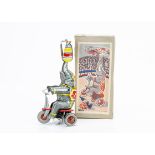 A NBN Tinplate Clockwork Circus Elephant On Tricycle, 1950s detailed tinprinted toy with fixed key