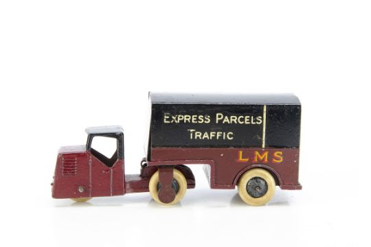 A Pre-War Dinky Toys 33rd 'LMS' Railway Trailer Van, 'LMS' livery, maroon and black body, black