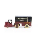 A Pre-War Dinky Toys 33rd 'LMS' Railway Trailer Van, 'LMS' livery, maroon and black body, black