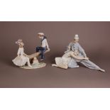 Two modern Lladro porcelain figural groups, one of a male and female ballerina, 36cm wide, the other