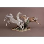 A large Lladro porcelain horse sculpture, 70cm wide, professionally restored to one of the legs,