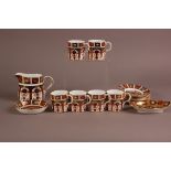 A second half 20th century Royal Crown Derby Imari style pattern set of six coffee cups and saucers,