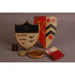 A small group of collectables, including a wooden and a metal painted crest shield, 18cm and 20cm, a