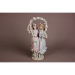 A modern Lladro porcelain figural group, 39cm, modelled as two young ladies holding a floral