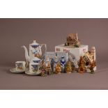 A large collection of Wade pottery and Lilliput Lane collectables, together with a Japanese