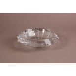 A c1950s Orrefors glass facetted bowl, 28cm, one large chip and other smaller chips to points, HR