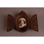 A second half 19th century German porcelain portrait plaque, depicting a young man, oval, 8cm by 6.