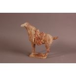 A 20th century Chinese pottery Tang style tomb horse, 32cm, tail snapped off and repaired