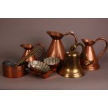 A set of three mid to late 20th century copper jugs, 28cm, together a set of sic copper and brass