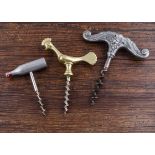 Seven Scandinavian 20th Century direct pull figural corkscrews, five pewter examples including a