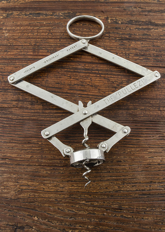 A 19th Century Heeley's nickel plated compound lever corkscrew, marked the Pullezi, 13cm with