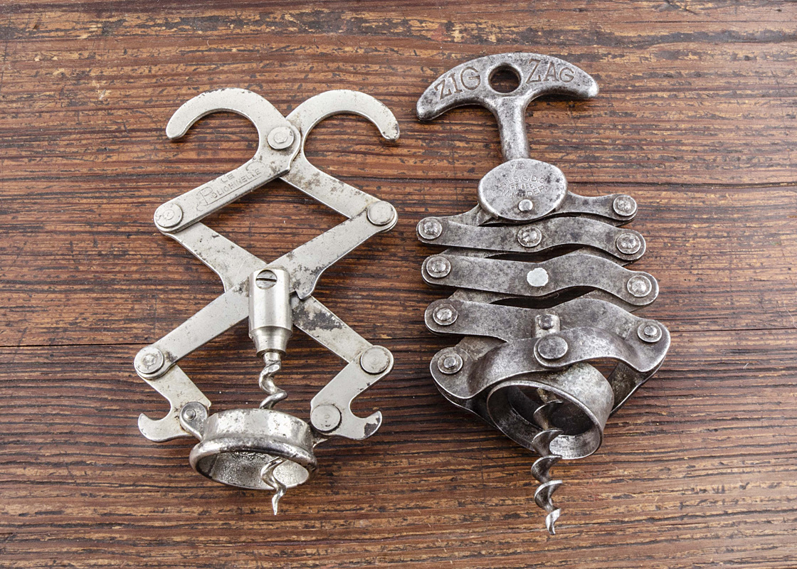 Four French compound lever corkscrews, a circa 1942 tin Zig Zag marked Bte sgdg Le Polichinelle, a