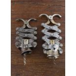 Two French 20th Century concertina corkscrews, patented by Jean Thomas in 1932 with spring mechanism