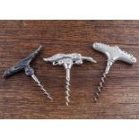 Seven Scandinavian 20th Century direct pull figural corkscrews, one eagle, a Danish brass example