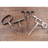 Nine metal direct pull corkscrews, including a cellarman marked 'R Jones', a Lund worm marked '