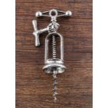 A 19th Century French nickel plated rack and pinion corkscrew, single ratchet wheel at front of