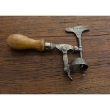 An English 19th Century Burgess & Fenton single lever corkscrew, John Burgess 1874 patent, marked