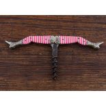 A German late 19th Century novelty folding 'Lady's Legs' pocket corkscrew, with full length pink and