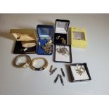 A quantity of assorted costume jewellery, including necklaces, earrings, compacts, watches, etc