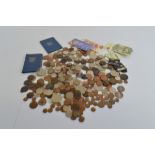 A quantity of miscellaneous British and World coinage, including a Victorian gothic florin, a wreath