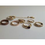 A collection of gold, including a heart shaped garnet ring in 9ct gold, a 14ct gold gem set dress