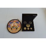 A Commemorative reproduction 1936 Edward VIII six piece coin set, boxed in outer card case. Together