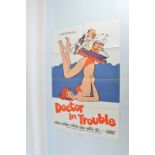 A vintage One Sheet Film Poster 'Doctor In Trouble', 27 x 40 inches, together with a US Insert