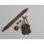A 1900 continental base metal and simulated turquoise chain purse, together with a cloth purse and a