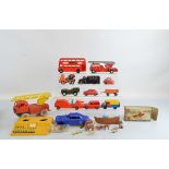A selection of vintage plastic vehicles, of British and Hong Kong manufacture by Tri-ang, Mettoy, OK