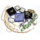 A quantity of gilt metal gem set and enamel work costume jewellery, beads etc