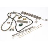 A collection of costume and silver jewellery, including cloisonne beads, watering can brooch and