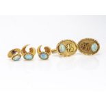 A pair of Chinese 14ct gold opal set oval shaped cufflinks, with matching dress studs, 14g