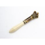 A Victorian gilt and ivory tipstaff, having crown terminal with red velvet inner marked to shaft