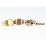 A 9ct gold double serpent dress ring, with ruby and diamond head to one serpent, the other with