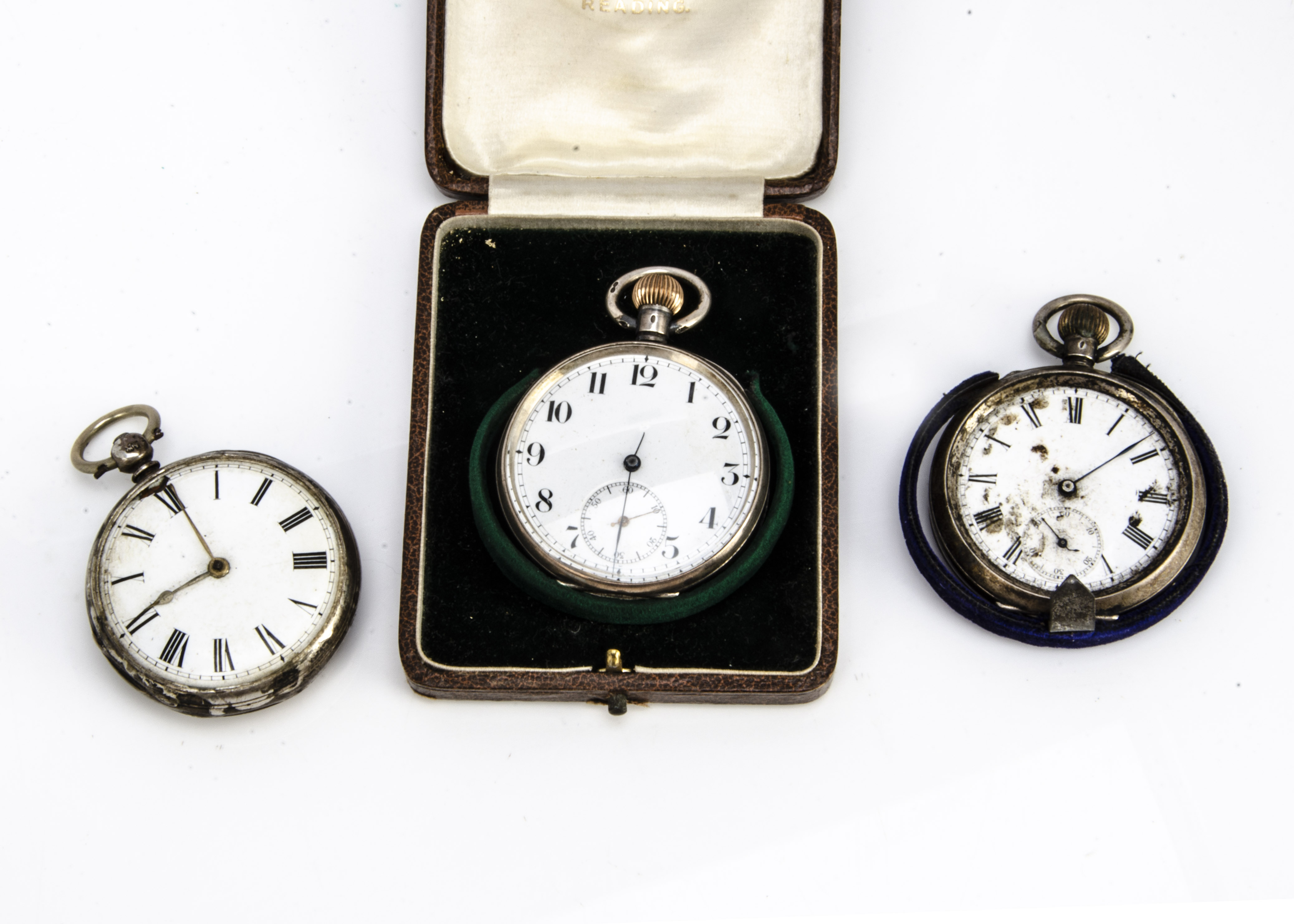 Three late Victorian and later silver open faced pocket watches, AF, one in retailers box (4)