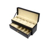 A modern black leatherette watch storage box