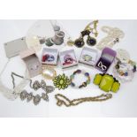 A quantity of costume jewellery, including various boxed Venetian glass rings, necklaces, beads