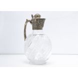 A nice Victorian silver and cut glass claret jug from J.G & S, the flattened oval shaped cut glass