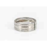 An 18ct white gold wedding band, in two pieces, 6.6g