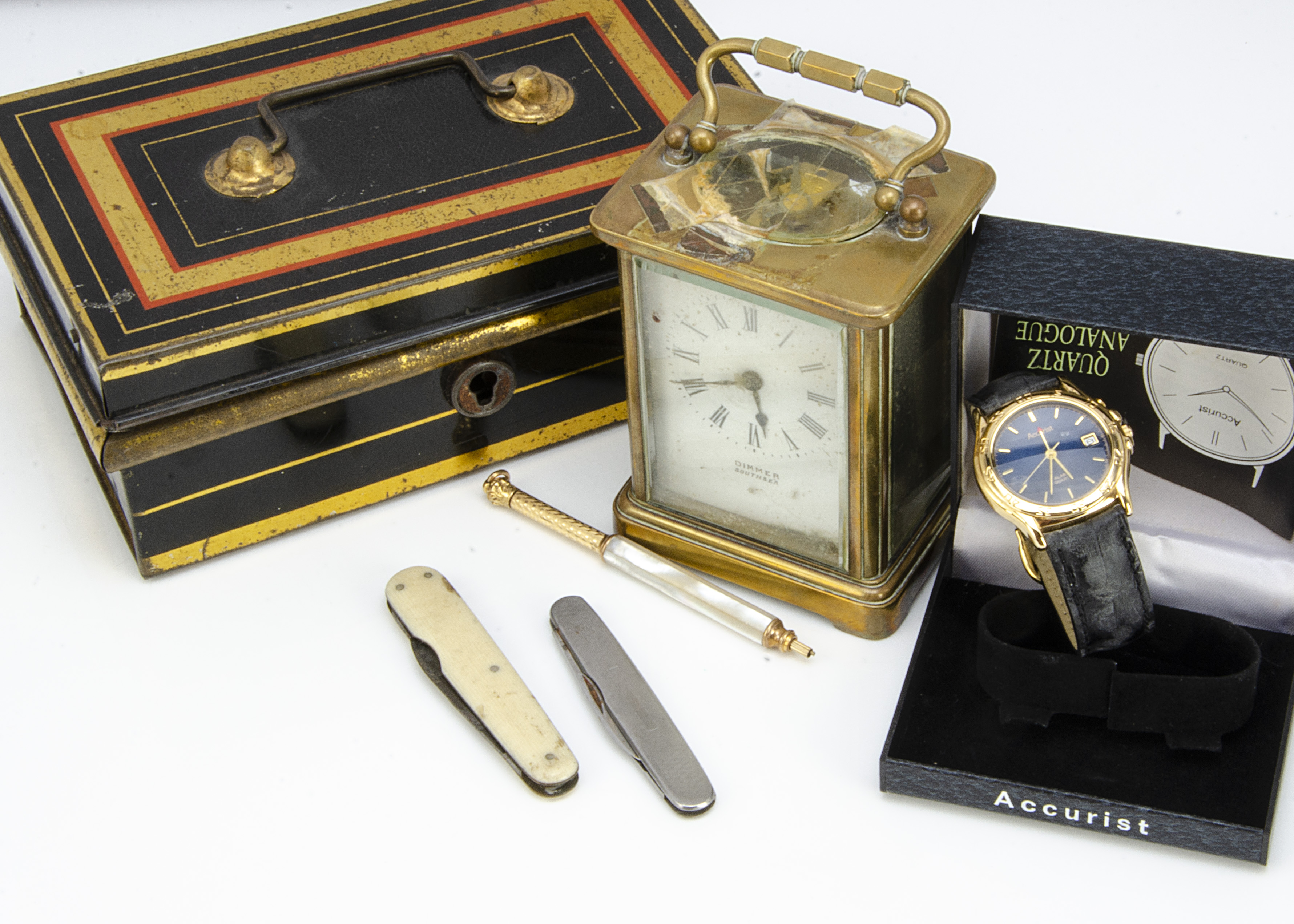 A vintage brass carriage timepiece, AF, together with a modern Accurist gents wristwatch in box, a