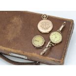 Two early 20th century ladies wristwatches and a 9ct gold locket, 33.2g (3)