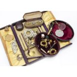 A Victorian mauve leather jewellery case, with a quantity of miscellaneous gilt metal and