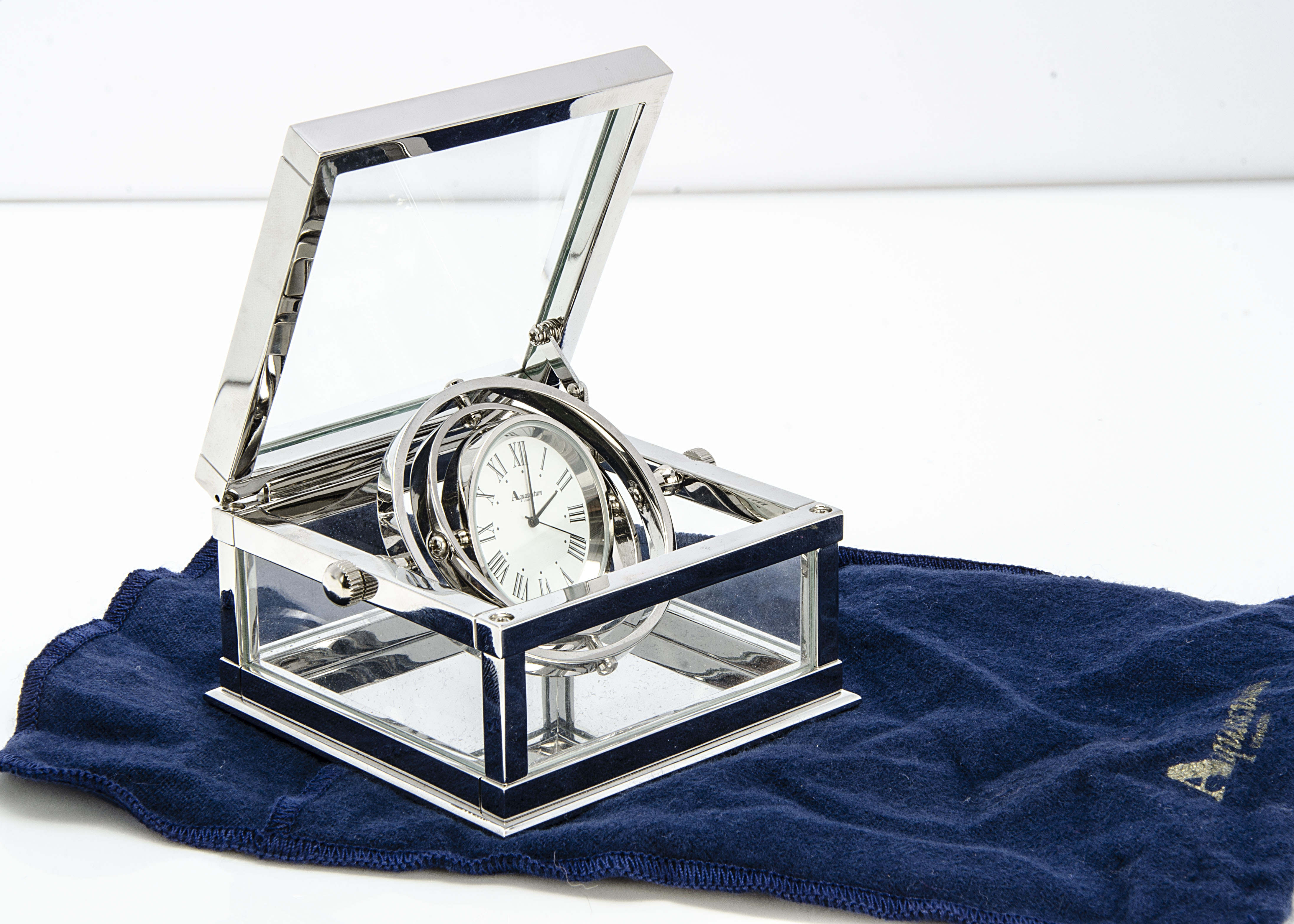 A modern silver plated desk clock from Aquascutum, square with glass panels and containing a ship' - Image 2 of 2