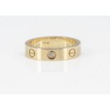 An 18ct gold ring, inscribed to inner shank Cartier with French dog strike marks, marked 750 Cartier