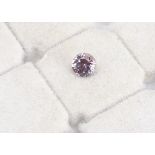 A certificated natural non heat treated pink sapphire, round cut 0.75ct, GCS certificate number